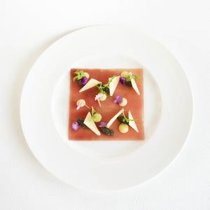 鮪のカルパッチョ トリュフとルッコラを添えて