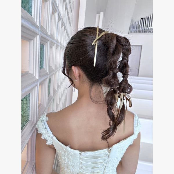ヘアメイクアーティスト：Rin